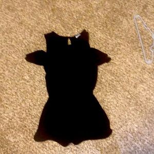 This is a KIDS black romper.